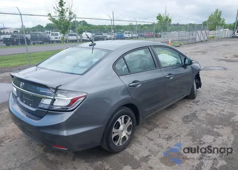 2013 Honda Civic Hybrid z USA, uszkodzony, nr VIN 19XFB4F28DE200562